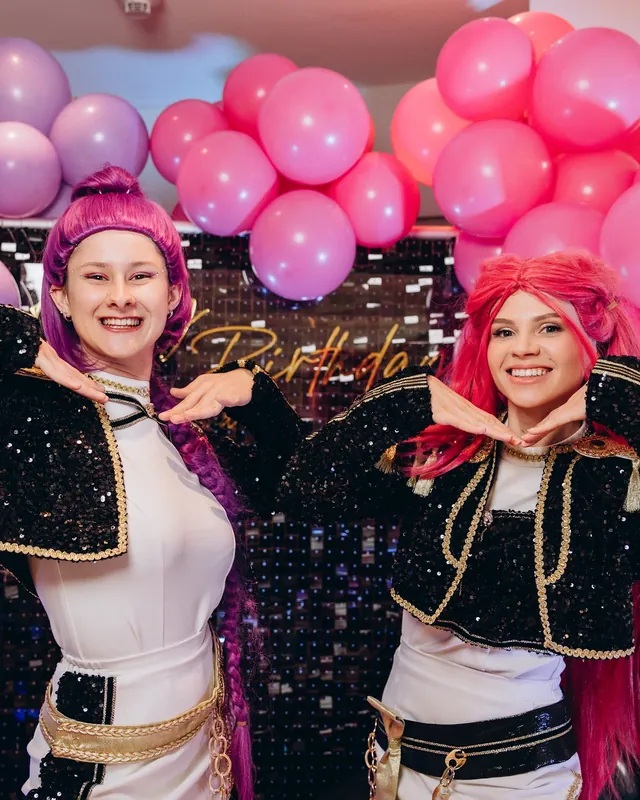 Two Hello Party entertainers in costume